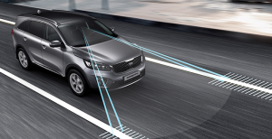 The Kia Sorento features a lane departure warning system that emits an audible alert whenever you stray from your chosen lane. Many manufacturers are now including these safety systems. (Photo credit: Kia.com)